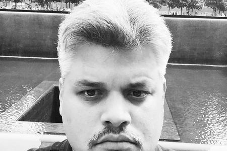 Black and white portrait of Aaron Harris